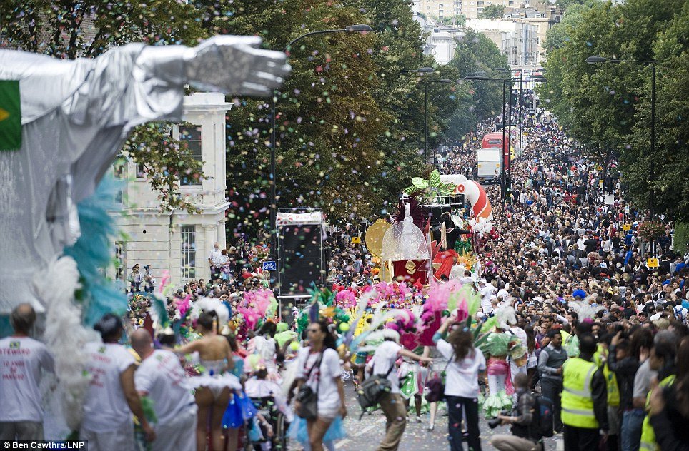 Hundreds of thousands of participants dancing and having a good time on West London streets at Notting Hill Carnival 2011
