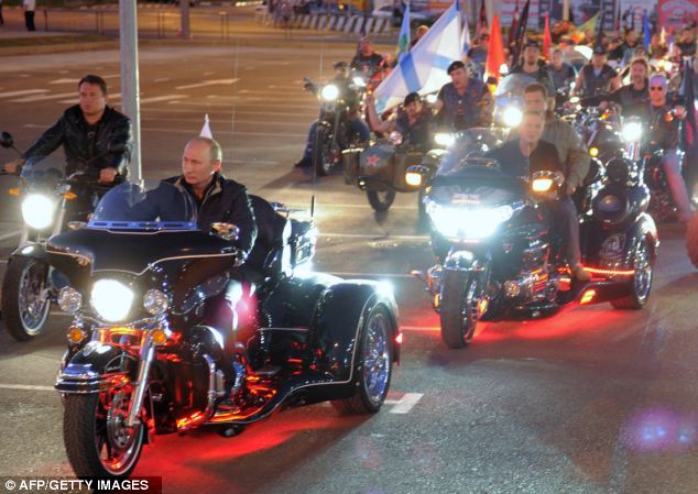 Vladimir Putin was riding a three wheeled Harley Davidson while he led the motorcade