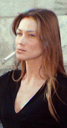 Carla Bruni smoking during her activity as model
