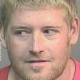 Darin Leutbecker was charged with robbery with a firearm and aggravated assault with a deadly weapon over Ronald Kroll