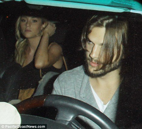 In the unearthed photographs, Ashton Kutcher is seen driving off with Sara Leal seated in the back seat of his car