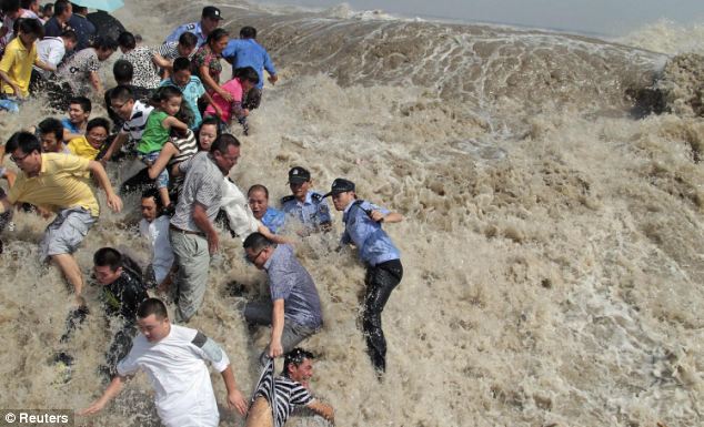 More than 20 people were injured after the wave swept through the throng