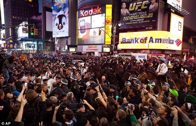 20,000 demonstrators swamped Times Square, stopping traffic, in what was thought to be the largest Occupy demonstration in the US so far