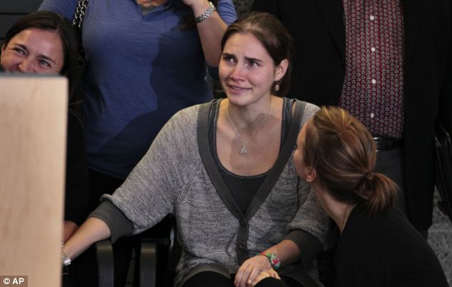Amanda Knox and her family during a brief news conference shortly after her arrival at Seattle-Tacoma International Airport