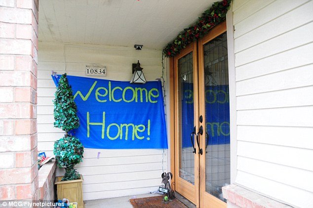 Amanda Knox's family home in Seattle, where a giant “Welcome Home” banner hangs by the front door