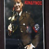 Angela Merkel wears a swastika armband bearing the EU stars logo on the outside