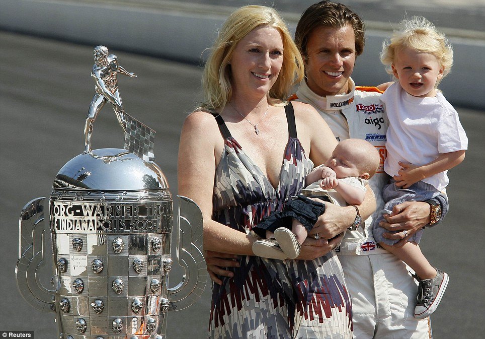 Dan Wheldon with his wife Susie, baby son Oliver, and older son Sebastian, when he won Indianapolis 500 in May 2011