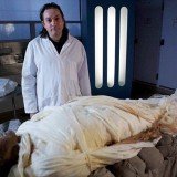 Dr Stephen Buckley with the mummified body of Alan Billis