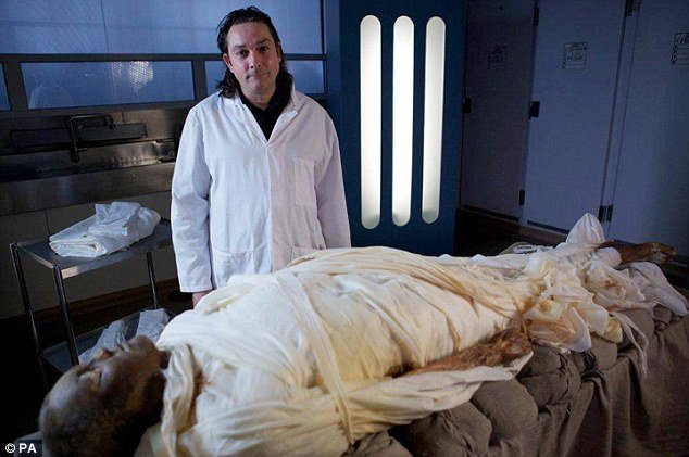 Dr Stephen Buckley with the mummified body of Alan Billis
