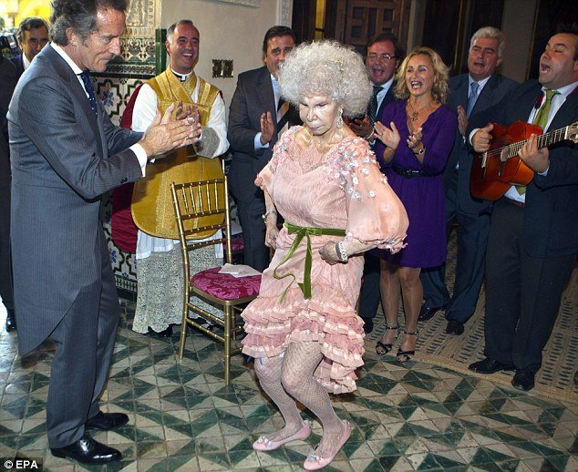 Duchess of Alba dancing with her new husband,  Alfonso Diez