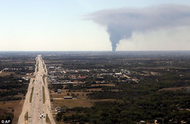 From Interstate 35E just south of Interstate 20, close to Dallas, a giant plume of smoke can be seen rising from the Magnablend chemical processing plant in Waxahachie, Texas