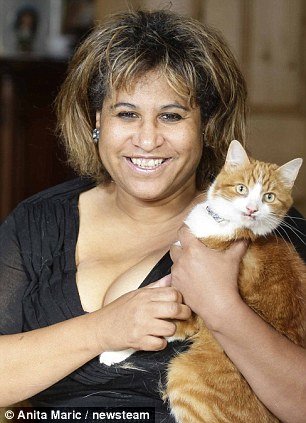 MP John Hemming’s wife, Christine with one of her six cats