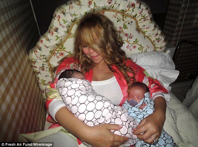 Mariah Carey has shared the pictures of her beautiful twin babies Moroccan and Monroe for the first time after six months she became a mother
