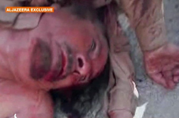Muammar Gaddafi dead body picture published by Al Jazeera