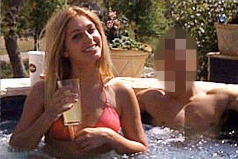 Sara Leal in a hot tub with a male friend