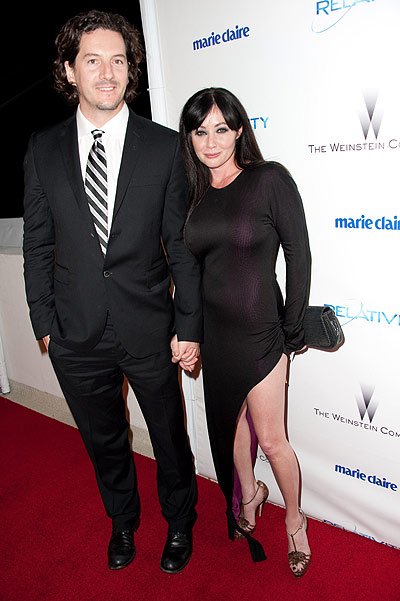 Shannen Doherty, 40, who has married for the third time, wed photographer Kurt Iswarienko at a pal's lavish private estate in Malibu