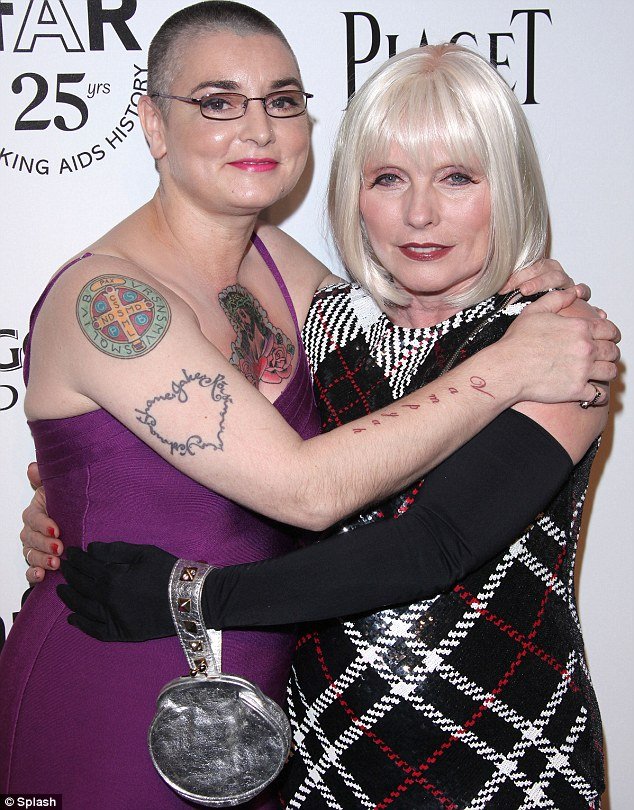 Sinead O’Connor and Deborah Harry looked more erratic than elegant as they posed together at the amfAR Inspiration Gala held at West Hollywood hotel, The Château Marmont