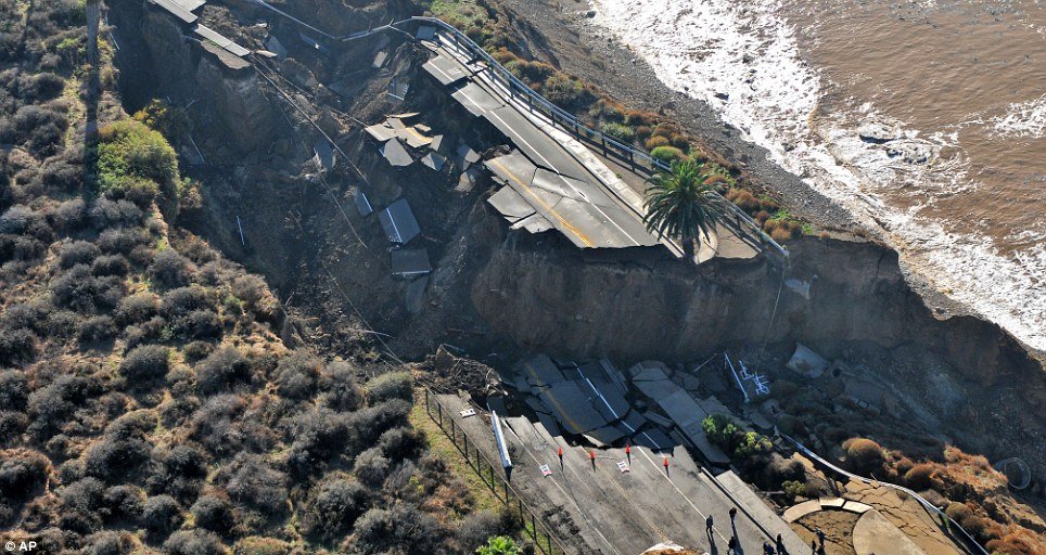 An enormous stretch of coastal road collapsed into the Pacific Ocean Sunday, and left a gaping hole where the road once was, after a large rainstorm in San Pedro