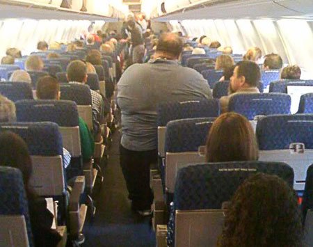 Arthur Berkowitz, an US Airways passenger had to stand during a seven-hour flight from Anchorage to Philadelphia because of a 400 lbs man sitting next to him