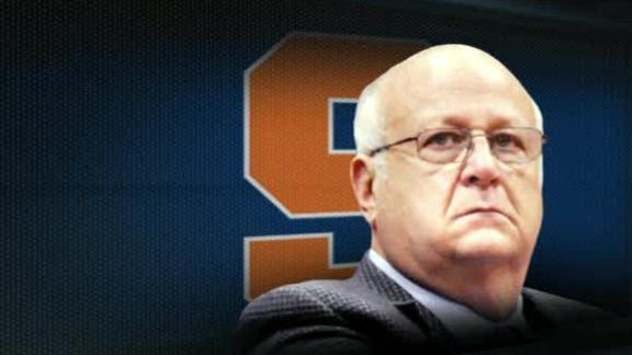 Bernie Fine, the Syracuse University basketball coach accused of sex abuse has been fired after damning new evidence suggested his wife watched him molest a boy who was staying at their house