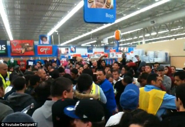 Dozens of Black Friday bargains hunters from a Wal-Mart store in Porter Ranch, Los Angeles were last night drenched in pepper spray when a woman looking for Xbox 360 console deals turned ugly