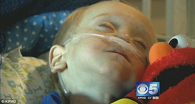 Emmett Rauch, a 2-year-old toddler from Arizona who swallowed a tiny battery, has undergone multiple surgeries as doctors struggle to save his life