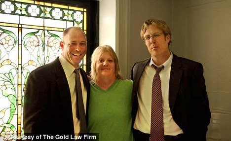 Holly Averyt with her attorneys