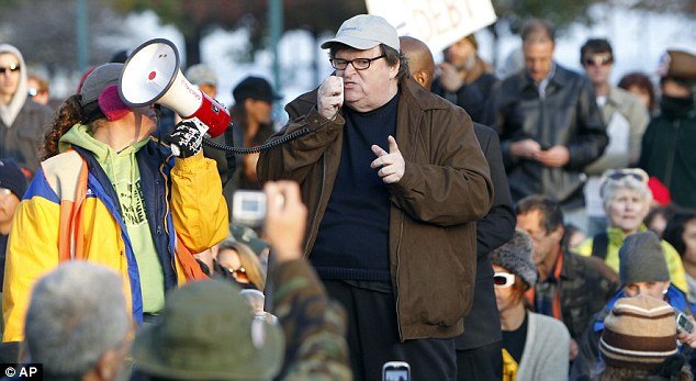 Michael Moore is the booming voice of the Occupy protests, encouraging activists to continue their battle against the wealthy one per cent of Americans, but he has been uncharacteristically quiet about one thing: his own wealth.