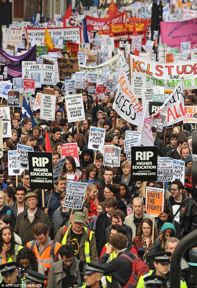 Students carried placards which read "Scrap Tuition Fees" and "Free Education"