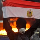 Two people have been killed and more than 670 injured after protesters clashed yesterday with security forces in Cairo and Alexandria