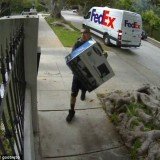 A hilariously sad clip of a FedEx delivery man chucking a computer monitor over a fence before returning to his van was posted on YouTube