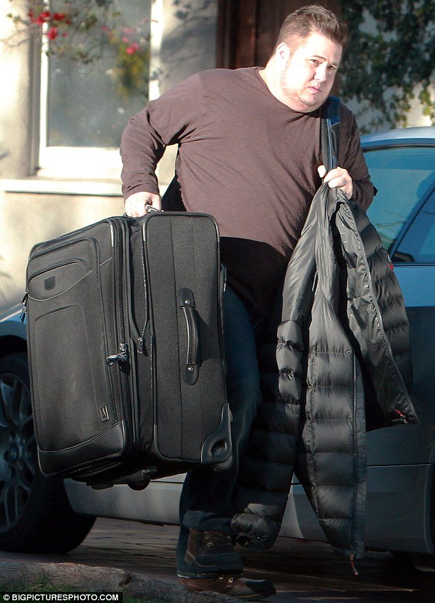 Chaz Bono, 42, was pictured leaving the LA residence with a large suitcase just days after announcing the end of his engagement with Jennifer Elia