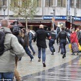 Four people have been killed and at least 75 were injured during a grenade attack in a Christmas shopping area in Liege, Belgium