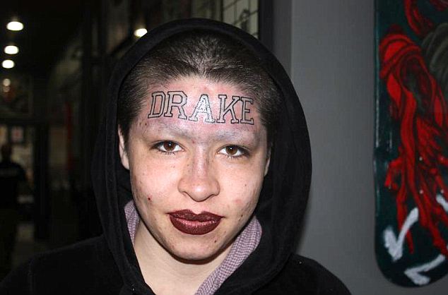 One fan has gone the extra mile to show rapper Drake how much he means to her - by getting the hip hop star’s name tattooed across her forehead
