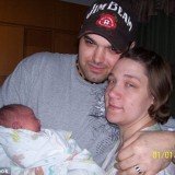 Sara McMeen and her boyfriend Daniel Warren with their newborn baby Maggie