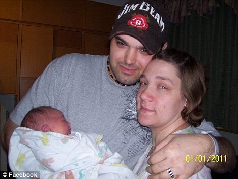 Sara McMeen and her boyfriend Daniel Warren with their newborn baby Maggie