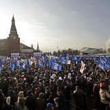 Tens of thousands of people gathered in central Moscow to protest against Vladimir Putin and the alleged electoral fraud
