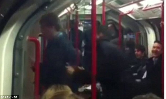 The video clip shows the dancing man happily ignoring fellow passengers as he boogies to the music playing through his headphones was shot by a fellow passenger seated further along the carriage