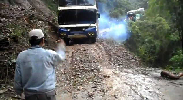 A shocking video captures the moment a double-decker bus plunged off a cliff on Camino de la Muerte, the world's most dangerous road, in Bolivia