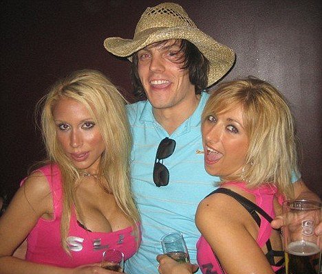 Martin O’Kane is pictured with a string of good-looking girls, often with drink in hand
