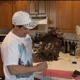 Michael Oreb, who had installed security cameras only a week ago, witnessed the moment the postal worker threw his precious package over the gate, apparently because he couldn’t get it open after one go