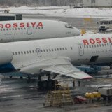 A Rossiya Airlines passenger jet which lost a wheel on take-off from Berlin has landed safely in St Petersburg