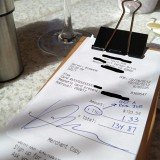 A banker dining at True Food Kitchen restaurant in Newport Beach, California, left only $1.33 on a $133.54 tab, enforcing his position as the “one per cent”.