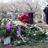 A day after Whitney Houston was buried at Fairview Cemetery in New Jersey her grave appeared covered by flower