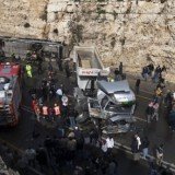 At least eight Palestinian children have been killed in a collision between a school bus and an Israeli lorry on a road in the West Bank