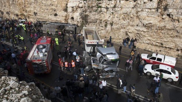 At least eight Palestinian children have been killed in a collision between a school bus and an Israeli lorry on a road in the West Bank