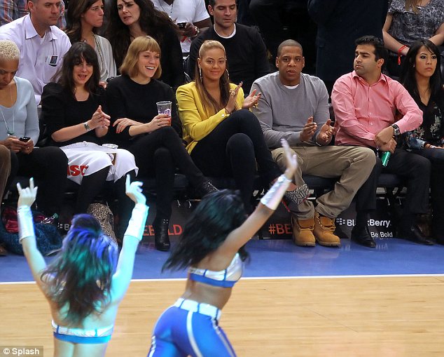 Beyoncé and Jay-Z made their first public appearance together since their daughter Blue Ivy was born at a basketball game