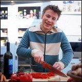 Boxes containing $1.5 million jewelry, master tapes of British band Joy Division and even a gun were allegedly discovered in the basement of the site of Jamie Oliver's new restaurant in Manchester