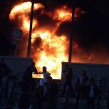 Egyptian authorities declared three days of national mourning after at least 74 people died in clashes between rival football fans in the city of Port Said Egyptian authorities declared three days of national mourning after at least 74 people died in clashes between rival football fans in the city of Port Said