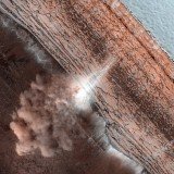 Images of an avalanche of fine ice and dust thundering over a cliff near Mars's north pole have been captured by a high resolution camera from a NASA spacecraft Images of an avalanche of fine ice and dust thundering over a cliff near Mars's north pole have been captured by a high resolution camera from a NASA spacecraft